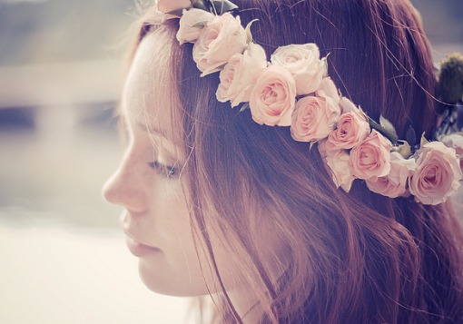 Girl with flowers on head