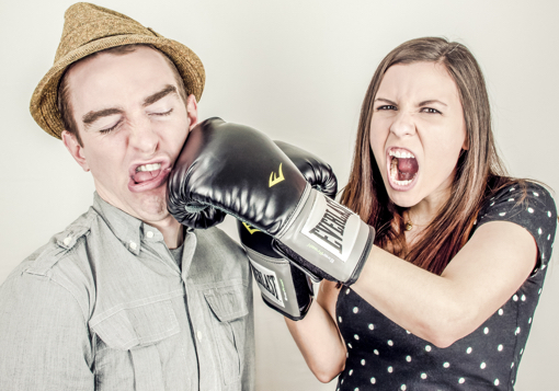 Girl punching guy