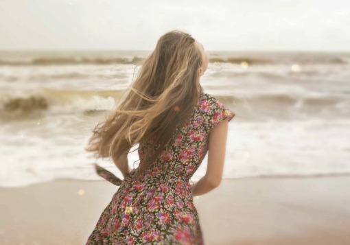 Girl happy on beach