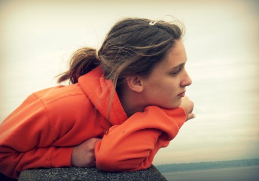 Girl Thinking and looking off into the distance.