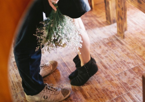 Girl and boy with flowers