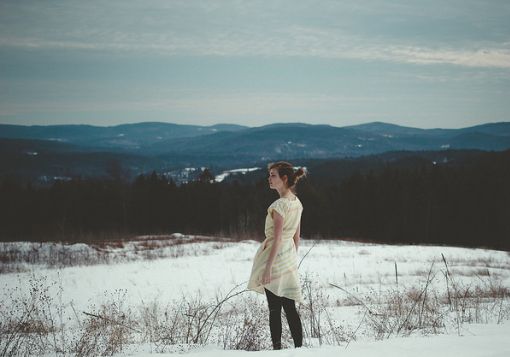 Girl Looking out over fields