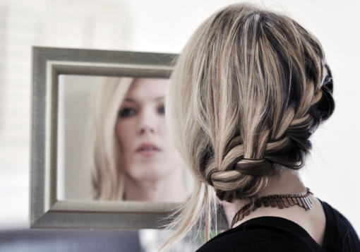 Girl looking in mirror