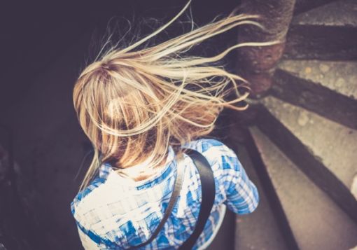 girl swishing hair