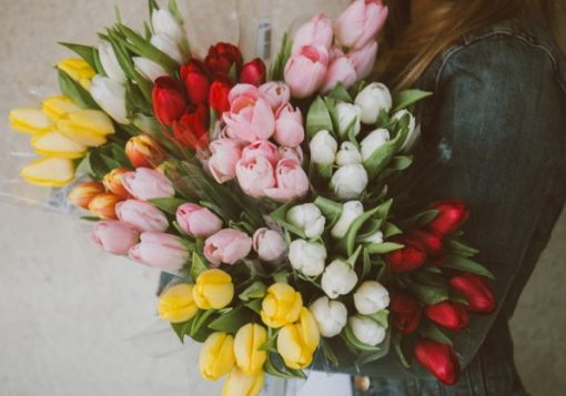 girl holding flowers