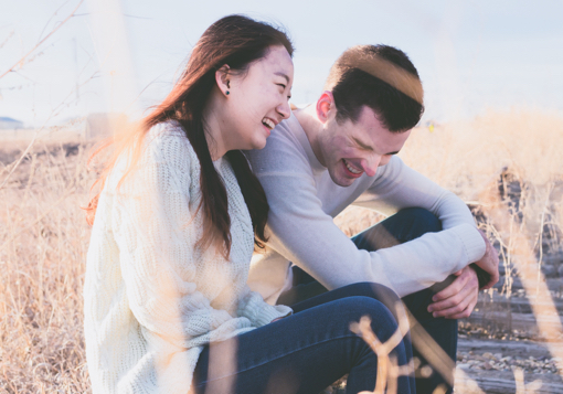 Girl and guy laughing