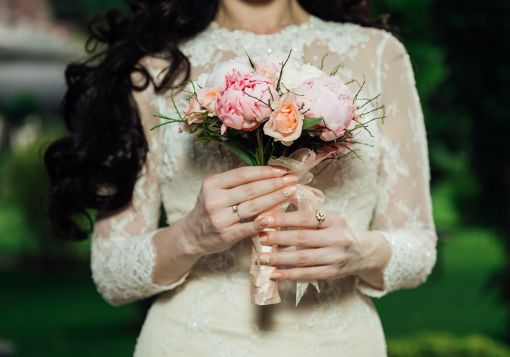 Girl holding flowers